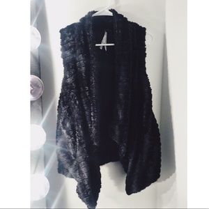 Black “Minky” feeling fur vest.